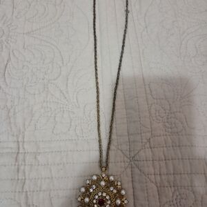 Elegant Gold and Silver Pendant Necklace